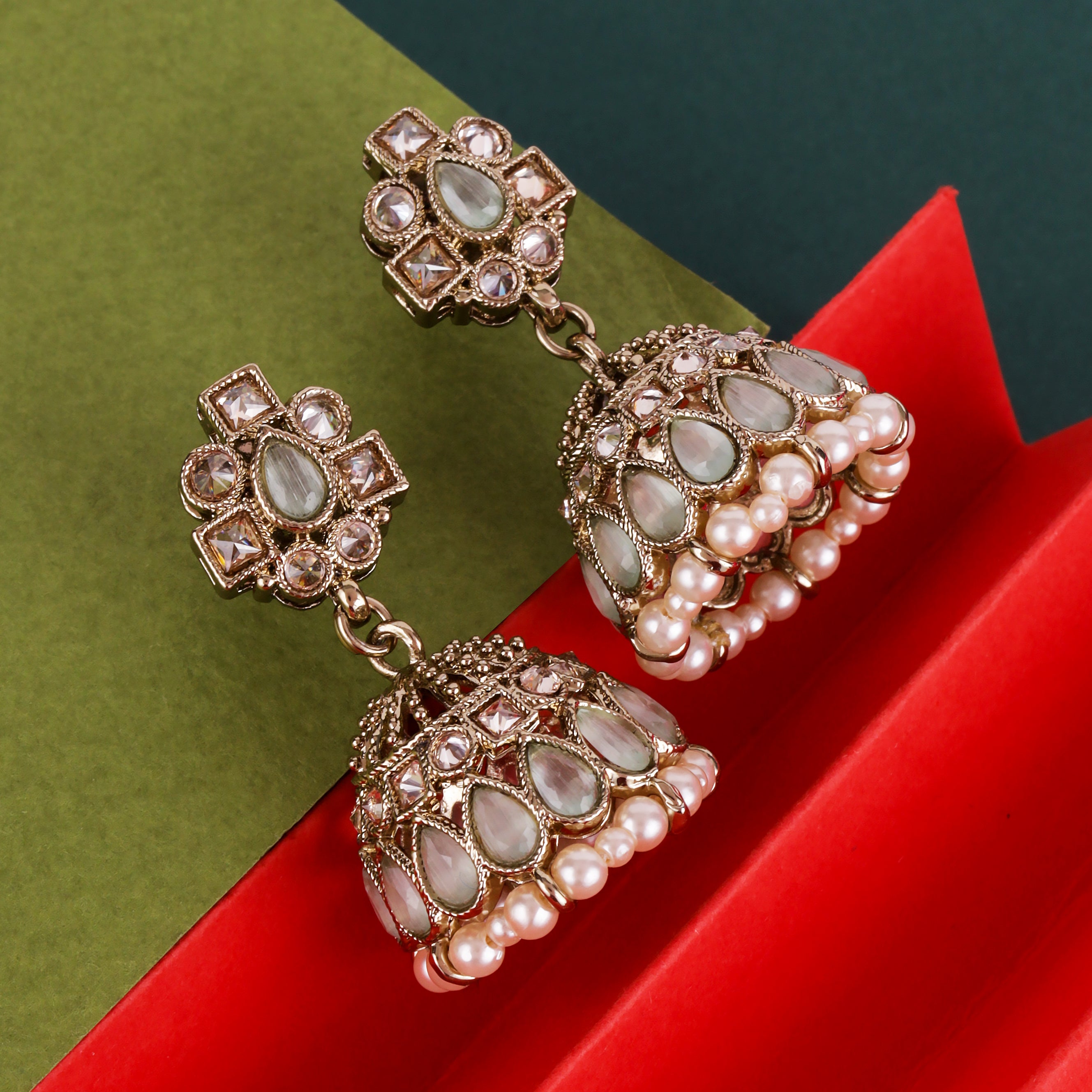 Oval Shape Sky Blue Uncut Kundan Stone Antique Gold Plated Jhumki Earrings - Sky Blue Jhumki Earrings by Yashwanti London